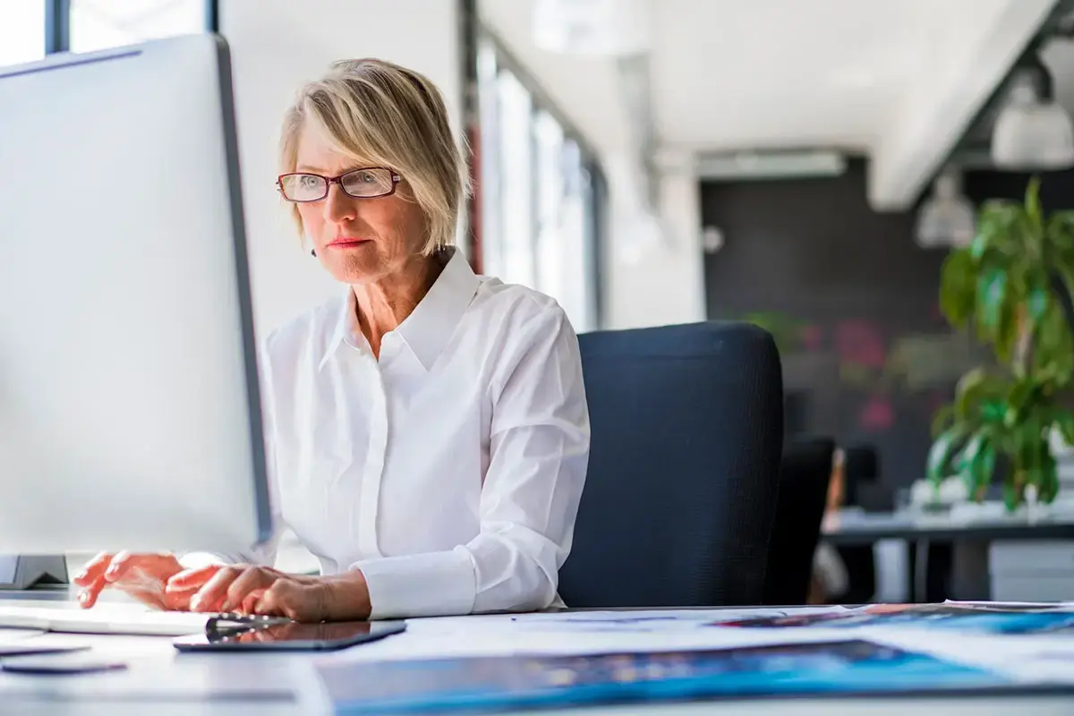 Woman using a computer in an office